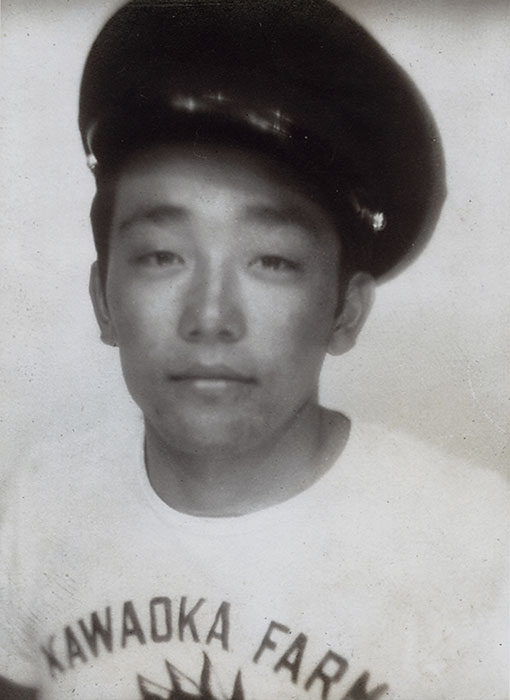 Young man wearing a Kawaoka Farm tee shirt.