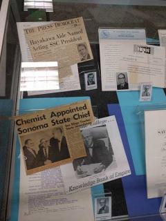 Display case containing articles about Dr Sakaki and previous Sonoma State Presidents.