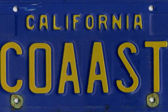 COAAST lettering on a license plate.