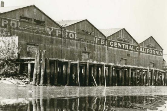 Old building with the words Poultry Products Central California on the side