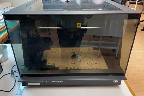 Glass on top and the sides of machine.  