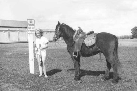 Woman with a horse on Sonoma State Campus