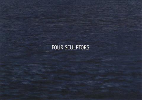 Four Sculptors text over ocean water