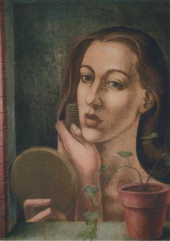 Woman combing her hair, looking into a mirror.