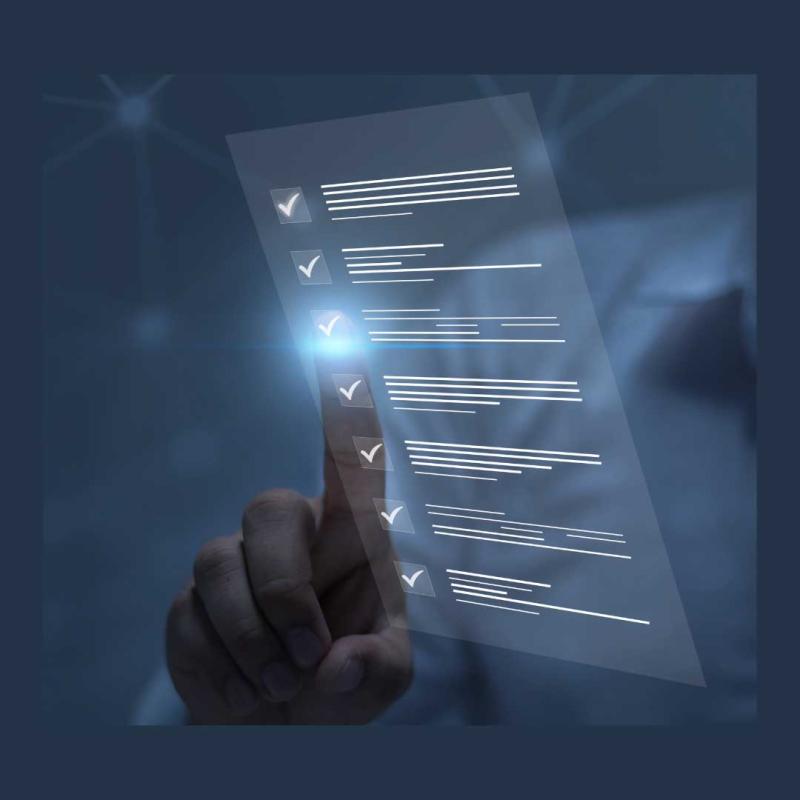 A digital checklist floating in the hair as a hand clicks on the display.