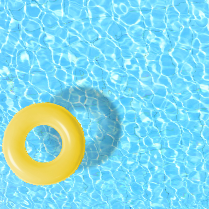 A yellow inner tube floating in a pool