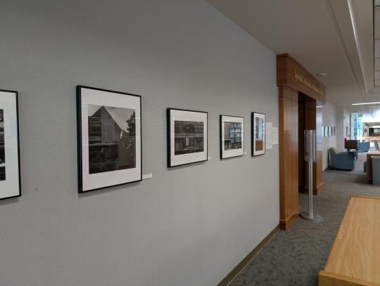 A photograph of a display of LeBaron's photography outside of Special Collections on the third floor of the library