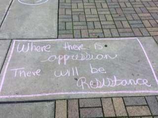 Chalk text of "Where there is opposition there will be Resistance"